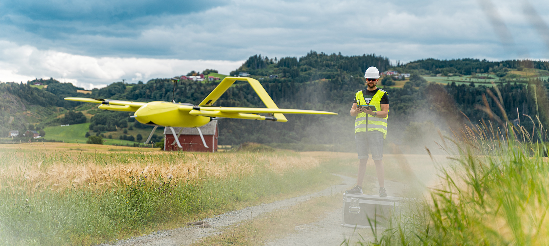 An Aviant-technician operating a flying drone